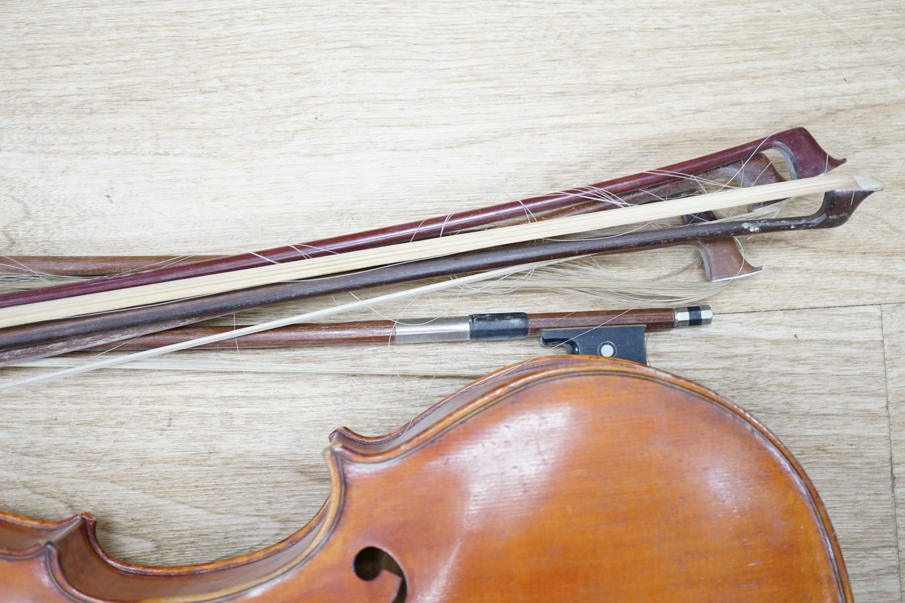 A Viola, assorted bows and a violin back